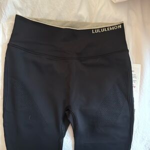 Lululemon black tights/leggings. Brand new. Size 4